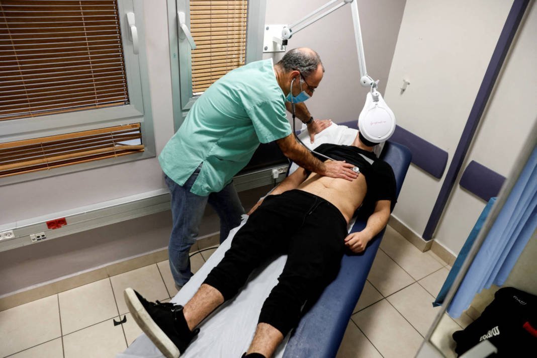 File Photo: A Patient Suffering From Long Covid Is Examined In The Post Coronavirus Disease (covid 19) Clinic Of Ichilov Hospital In Tel Aviv