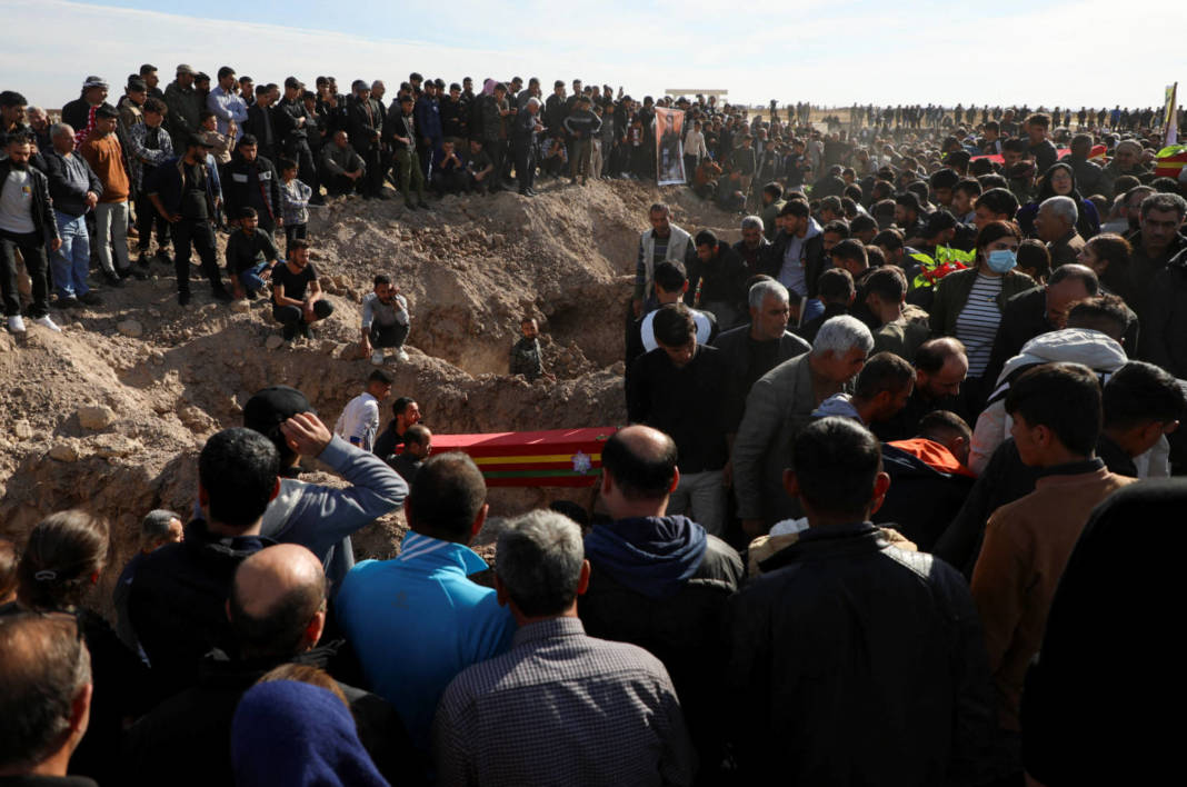 People Gather During A Funeral In Derik Countryside