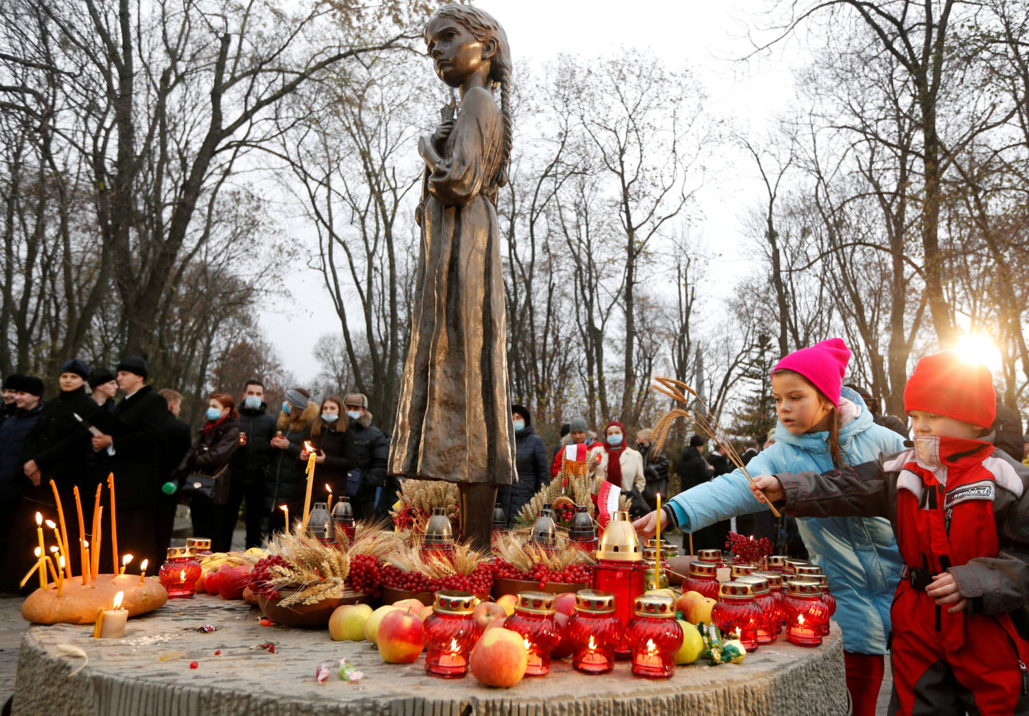 File Photo: People Visit A Monument To Holodomor Victims In Kyiv