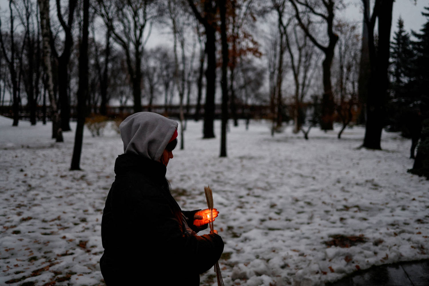 People Visit A Monument To Holodomor Victims In Kyiv