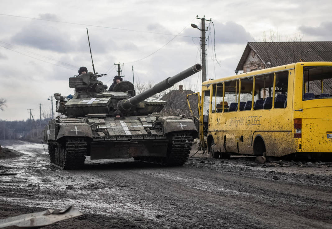 Ukrainian Servicemen Ride A Tank In The Village Of Torske