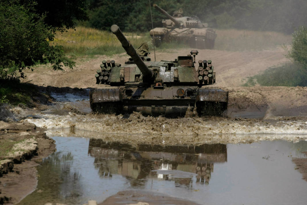 File Photo: The Polish Tank Pt 91, A Newer Model Of The Soviet Tank T 72, Drives Through Water At The Military Base In Bedrusko Near Poznan, Western Poland