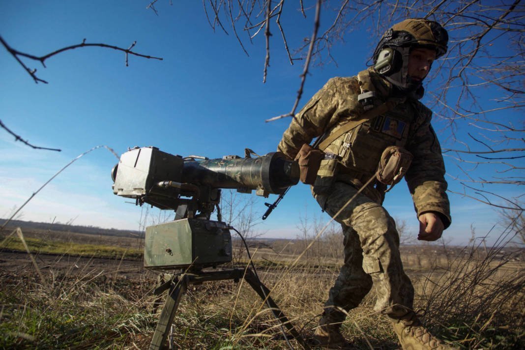 Ukrainian Serviceman Walks Near A Stugna P Anti Tank Guided Missile Launcher In A Frontline In Donetsk Region