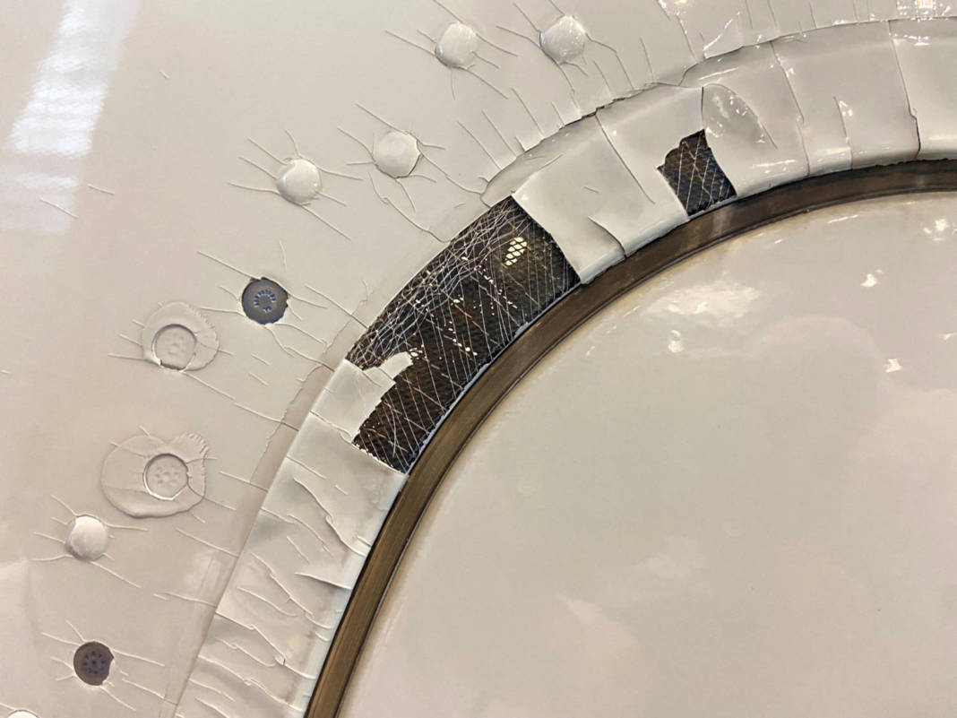 File Photo: An Undated Image Shows What Appears To Be Paint Peeling, Cracking And Exposed Expanded Copper Foil (ecf) On The Window Of A Qatar Airways A350 Aircraft