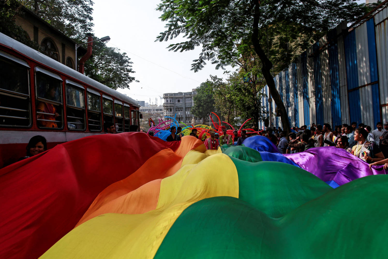 File Photo: Participants Hold A Rainbow Flag During Gay Pride Parade, Which Is Promoting Gay, Lesbian, Bisexual And Transgender Rights, In Mumbai