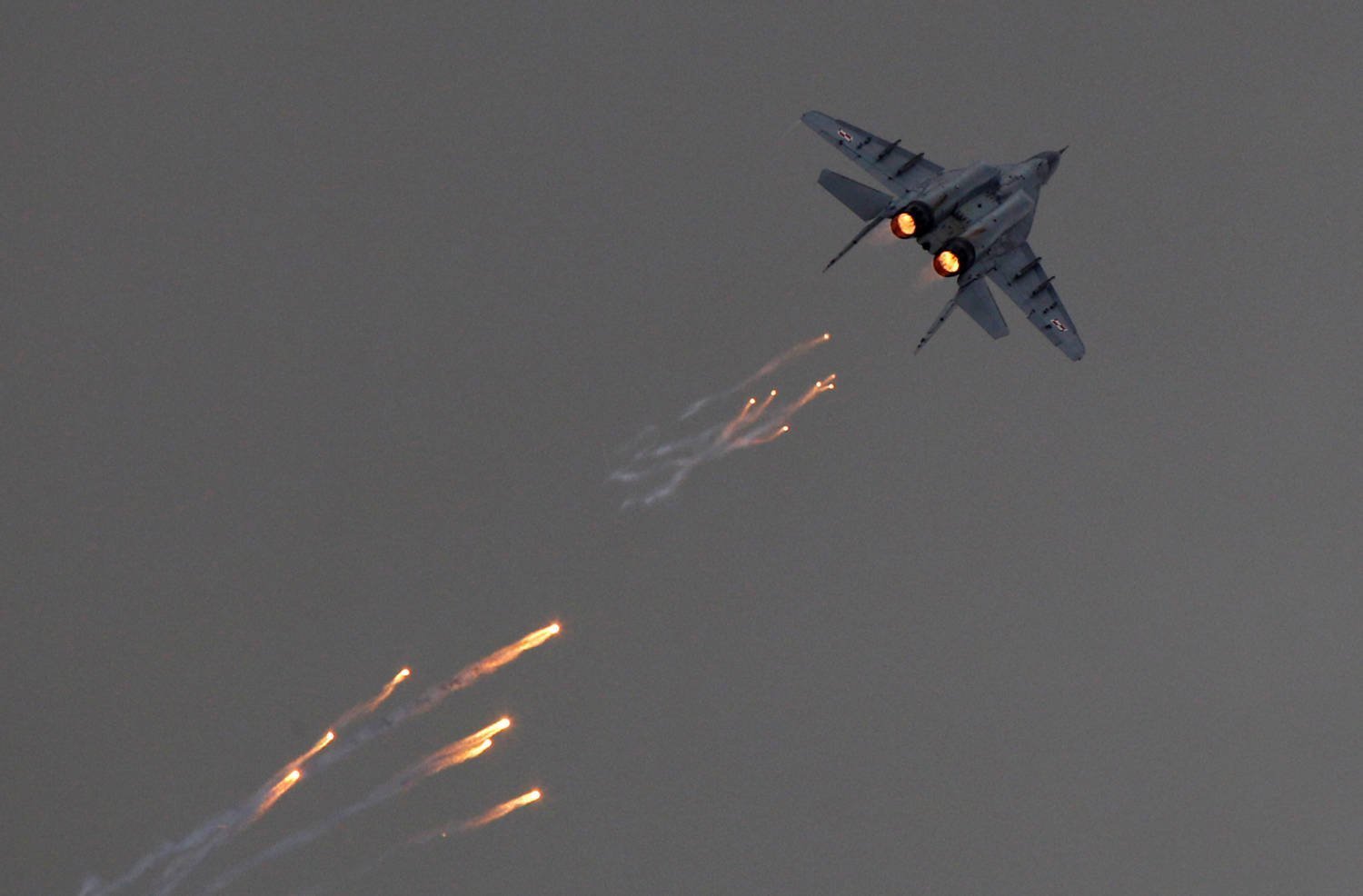 File Photo: A Polish Air Force Mig 29 Aircraft Fires Flares During A Performance At The Radom Air Show At An Airport In Radom