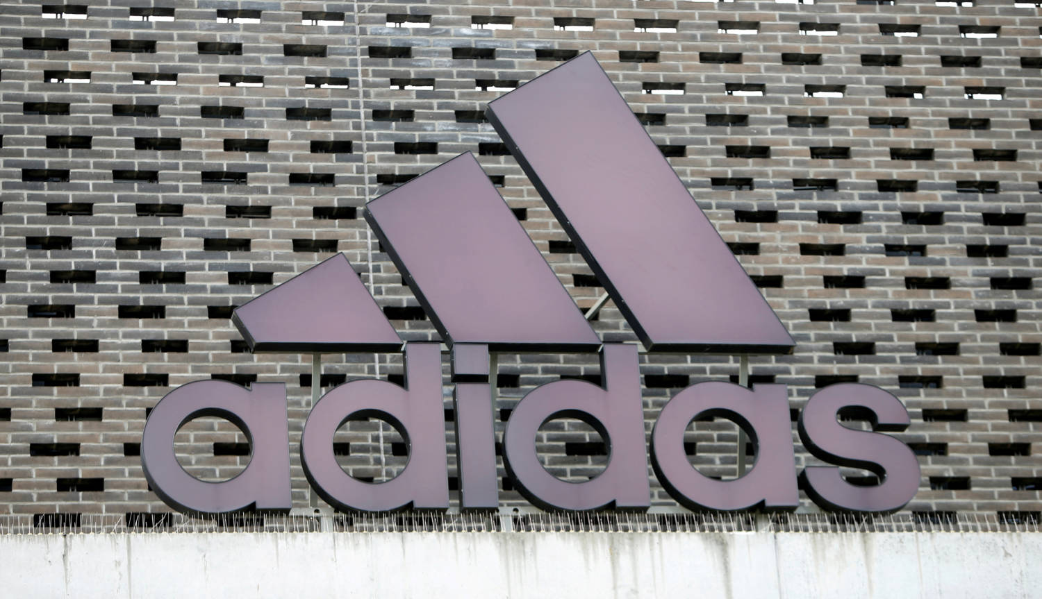 File Photo: The Logo Of Adidas Is Seen On An Outlet Store In Metzingen