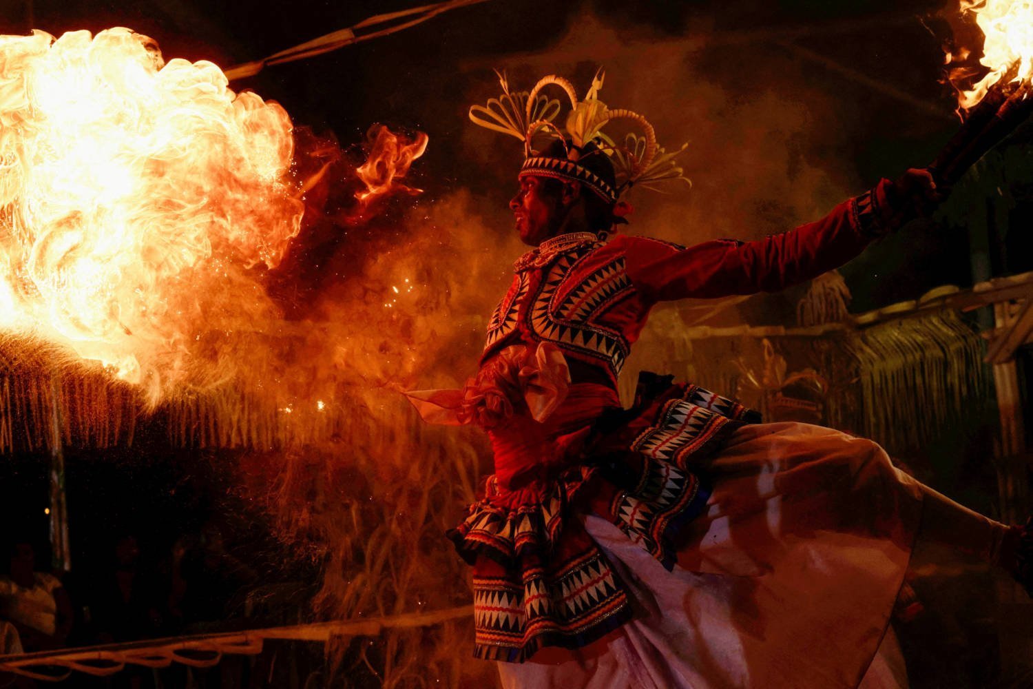 A Sri Lankan Dancer Performs With Fire At A Gammaduwa Performance In Colombo