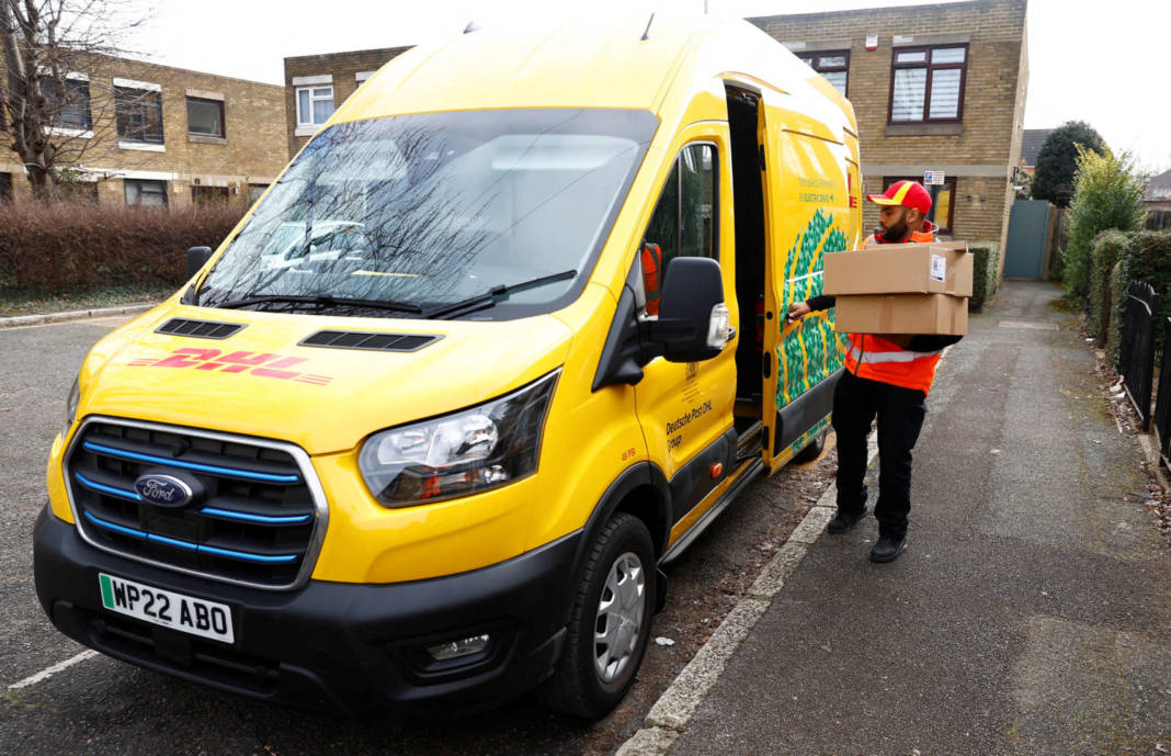 Senior Courier For Dhl, Christopher Brownbill, Delivers Packages From A Ford E Transit In London