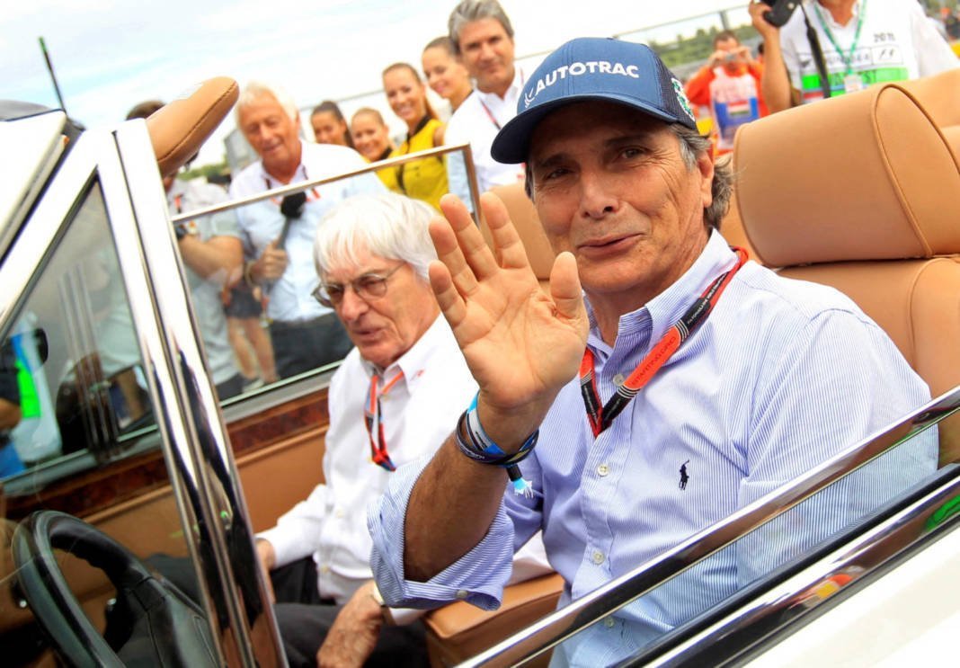 File Photo: Former Formula One Driver Piquet Of Brazil And Formula One Supremo Ecclestone Arrive At The Drivers Parade Before The Hungarian F1 Grand Prix At The Hungaroring Circuit, Near Budapest
