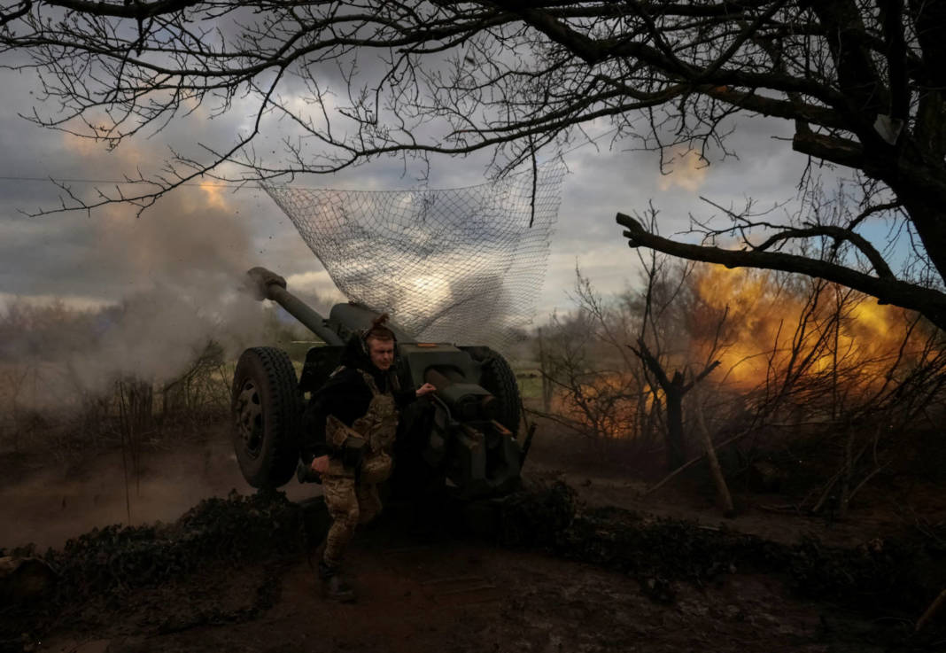 File Photo: Ukrainian Service Members Fire A Howitzer D30 At A Front Line Near The City Of Bakhmut