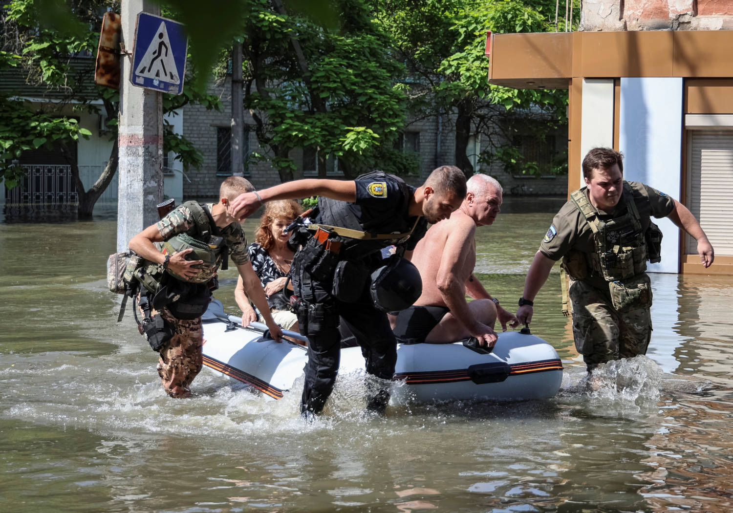 Police Evacuate Local Residents From A Flooded Area After The Nova Kakhovka Dam Breached, In Kherson