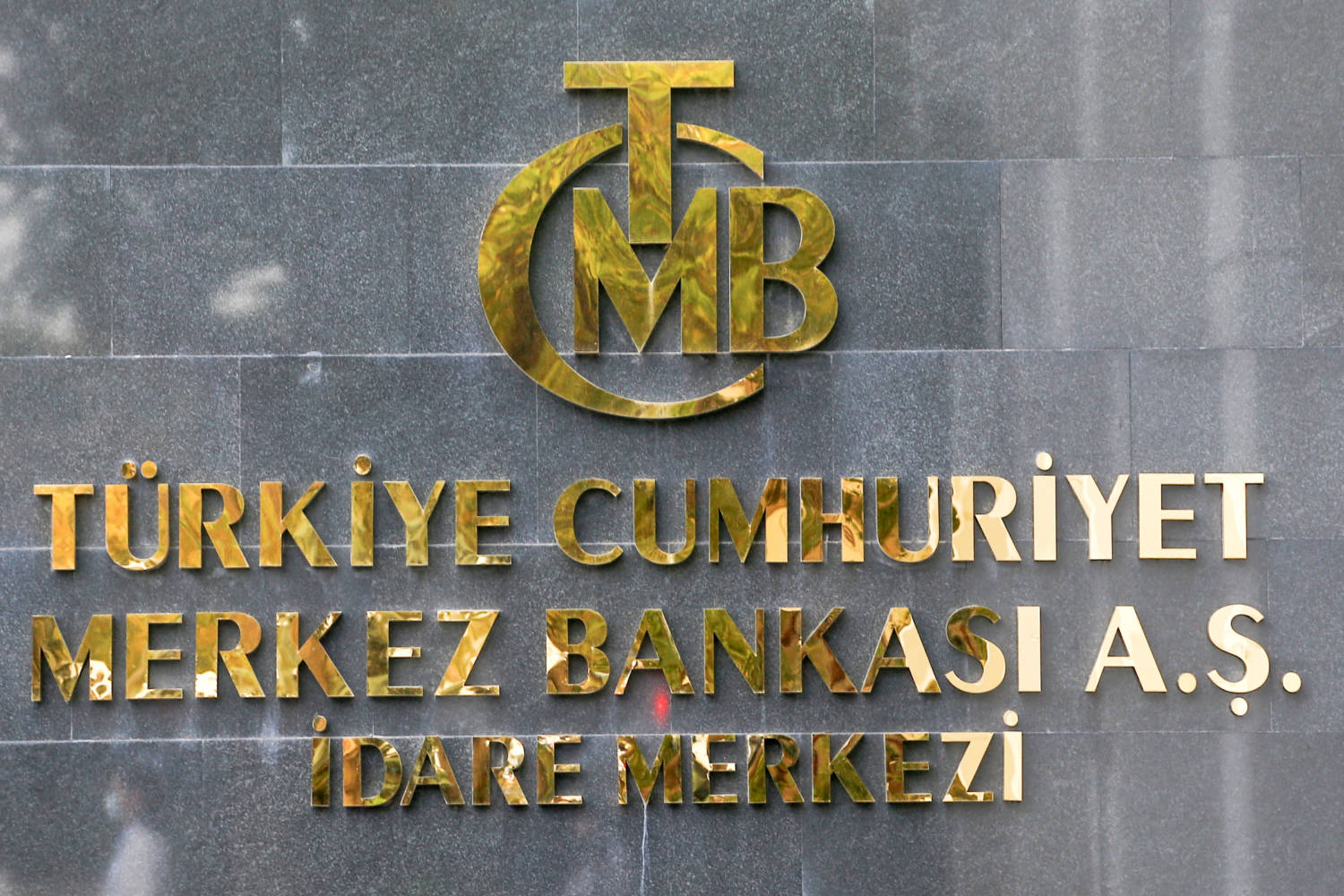 File Photo: A Logo Of Turkey's Central Bank Is Pictured At The Entrance Of Its Headquarters In Ankara