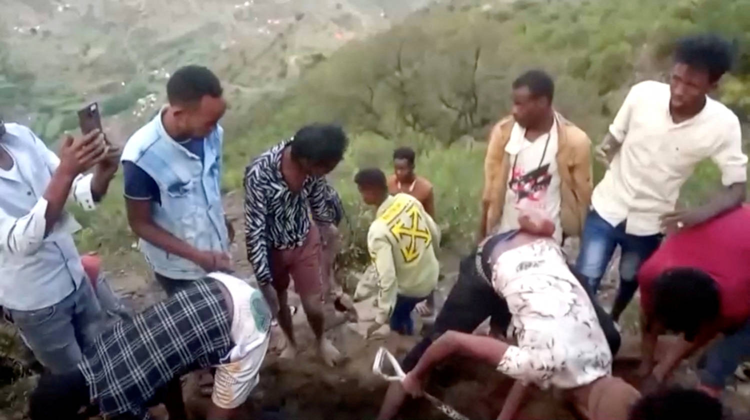 Migrants Dig A Grave Near The Trail From Al Thabit Into Saudi Arabia, On The Yemen Side