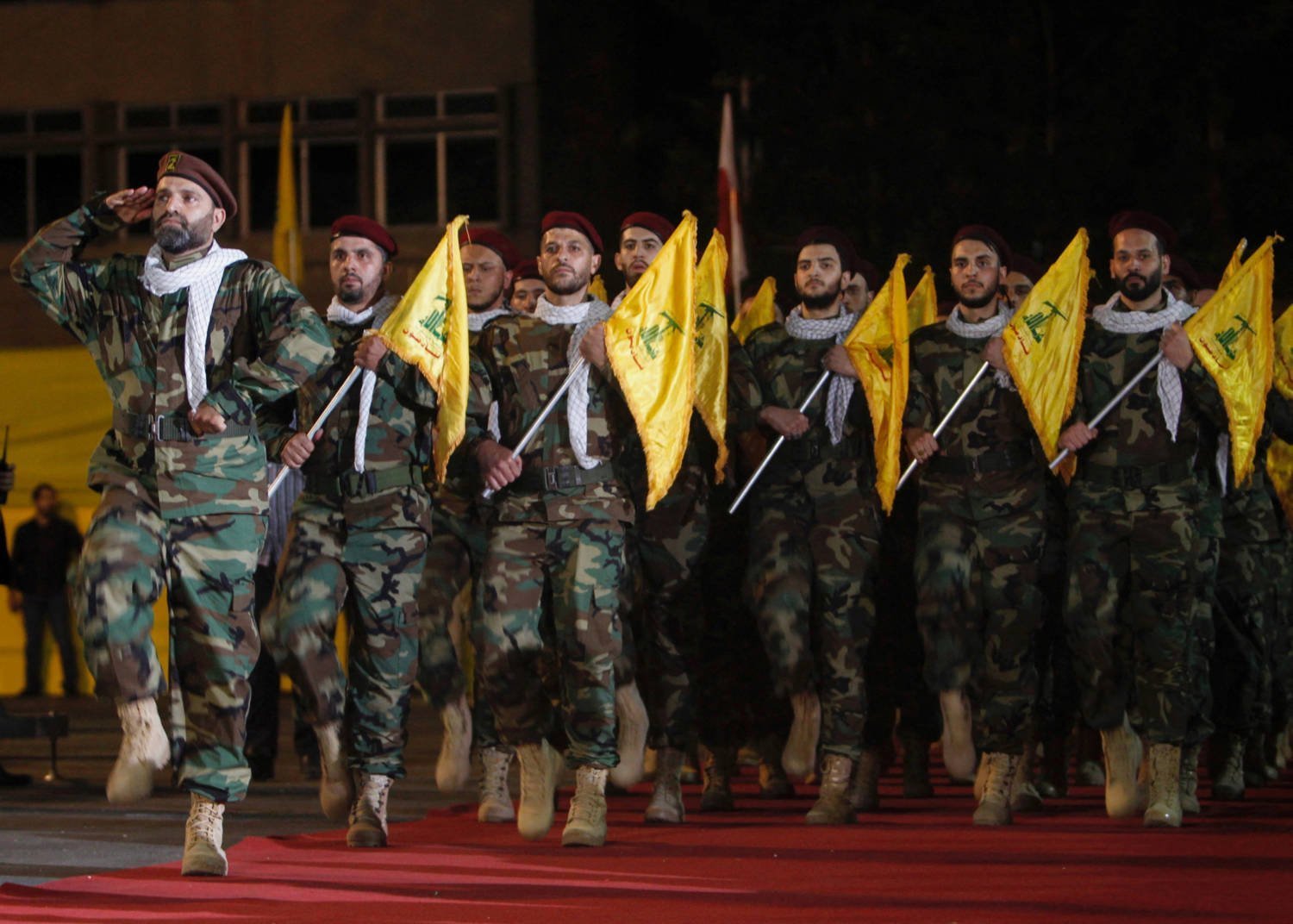 File Photo: Members Of Hezbollah March With Party's Flags During A Rally Marking Al Quds Day, (jerusalem Day) In Beirut