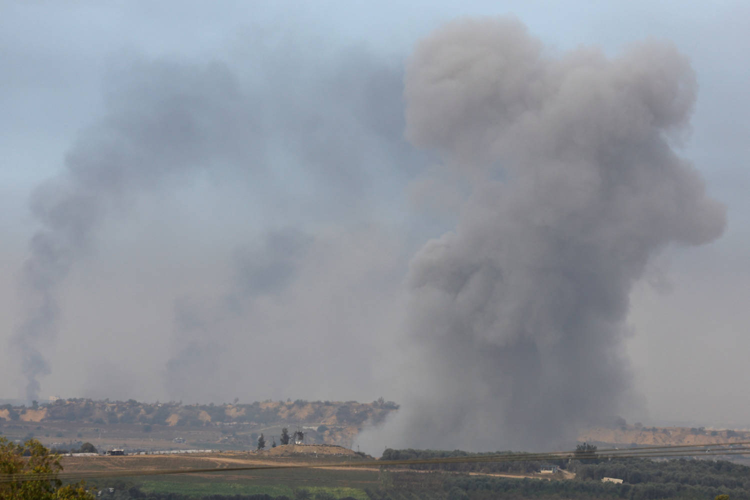 Smoke Rises On The Outskirts Of Gaza Following An Airstrike, As Seen From Southern Israel