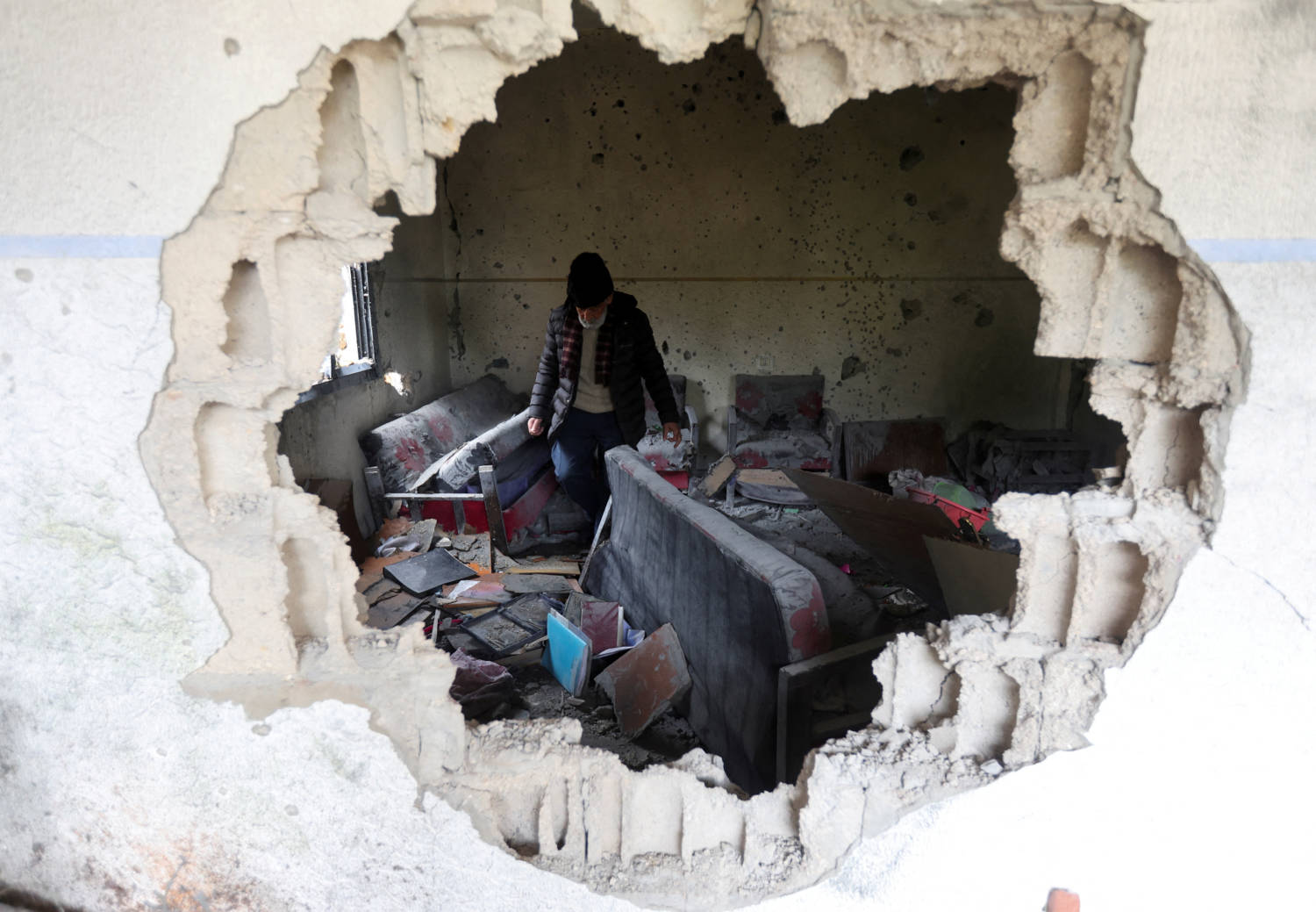 Hussein Jaber Walks Inside His Damaged House In Mhaibib