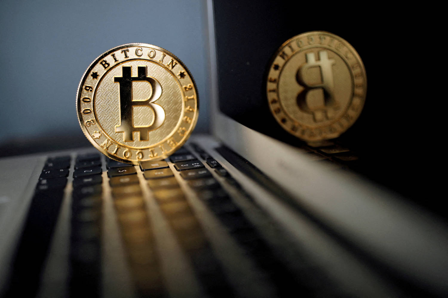 File Photo: A Bitcoin Is Seen In An Illustration Picture Taken At La Maison Du Bitcoin In Paris