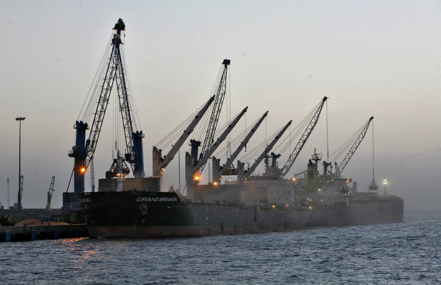 File Photo: Cargo Ships Are Loaded With Wheat At The Mundra Port In Gujarat