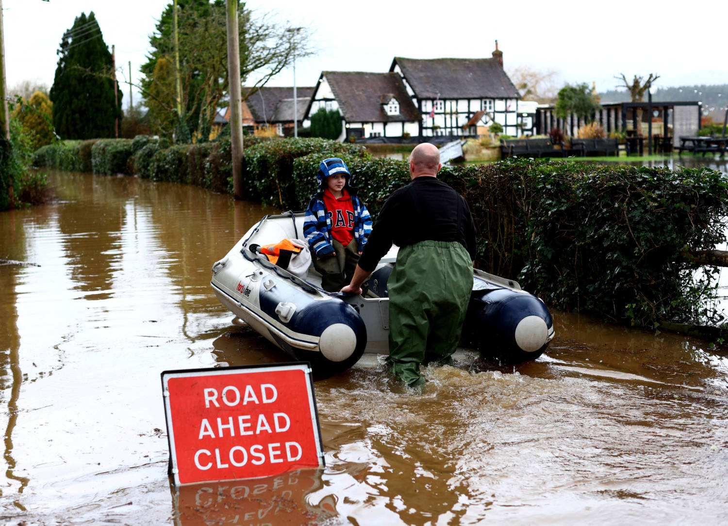 Jack, Aged 7, Is Rescued As The Village Of Severn Stoke Is Cut Off Amid Flooding After Heavy Rain From Storm Henk