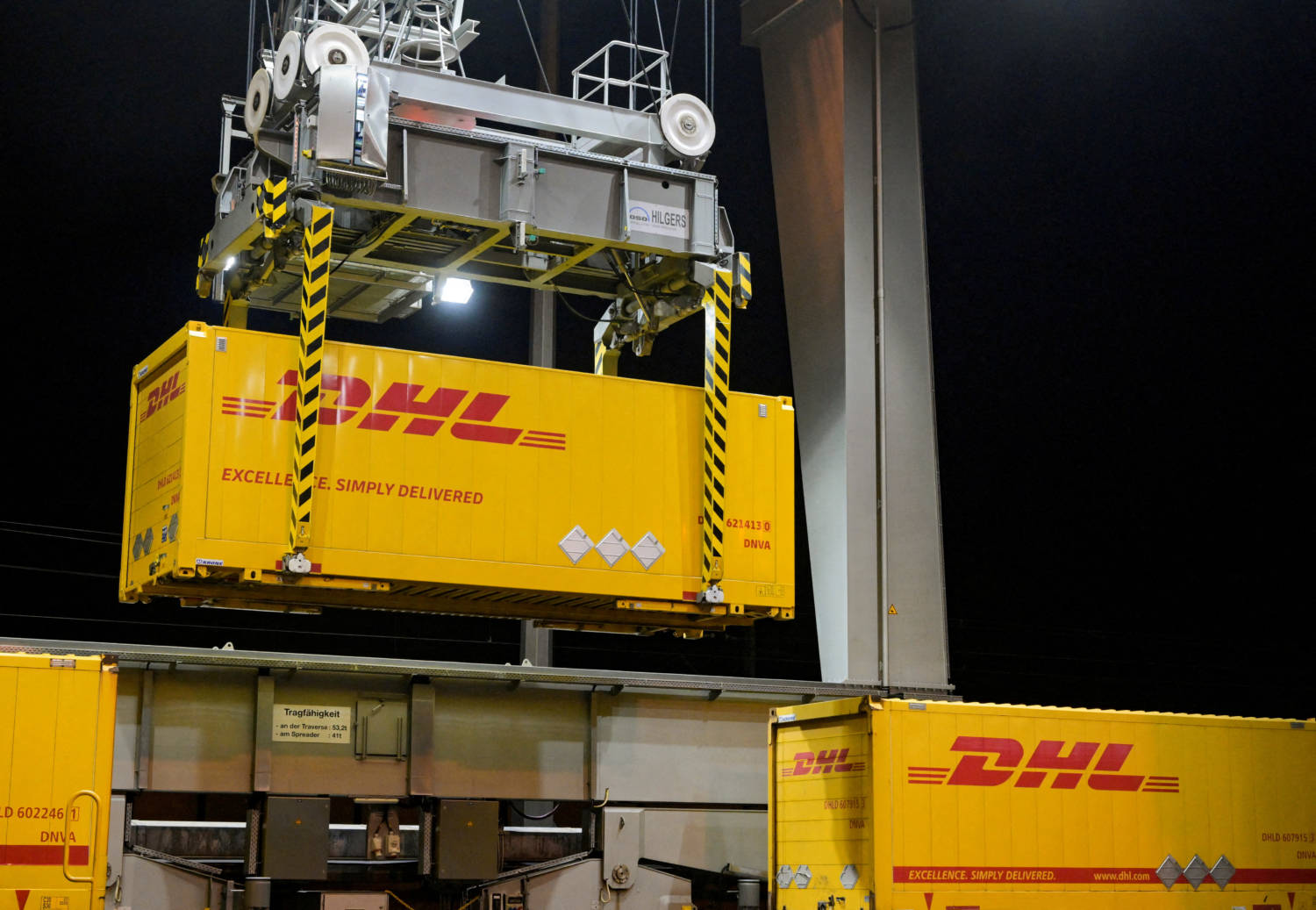 File Photo: Containers Of Dhl Are Loaded On Trains At A Terminal In Hamburg, Germany