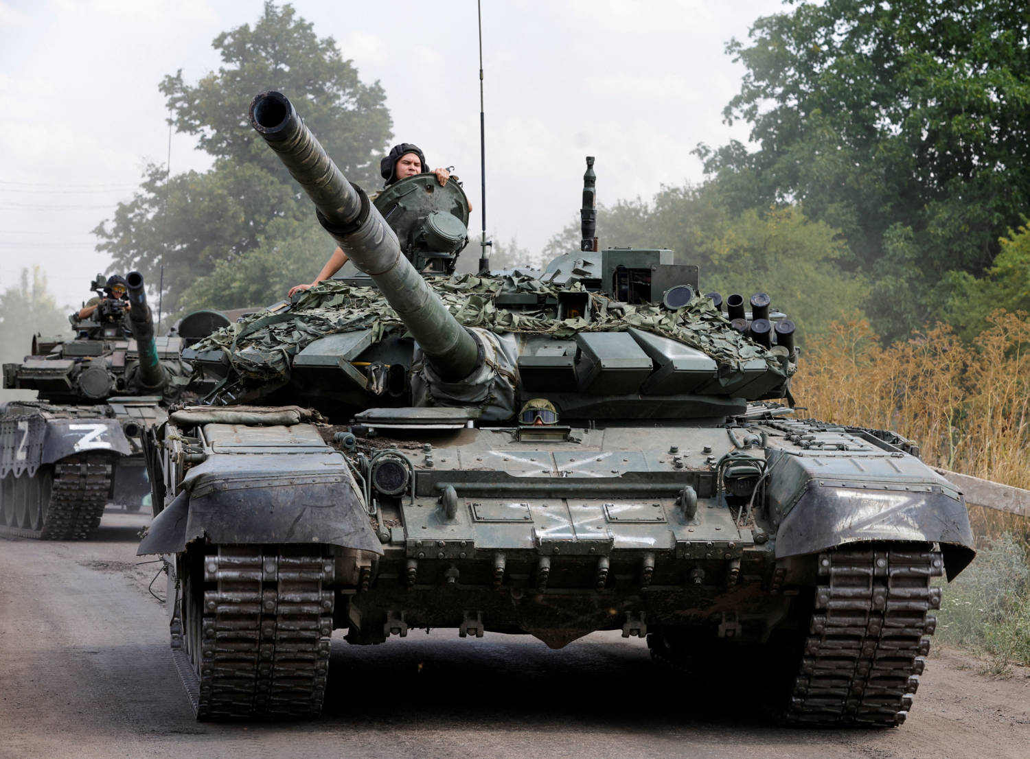 File Photo: Service Members Of Pro Russian Troops Drive Tanks In The Course Of Ukraine Russia Conflict Near The Settlement Of Olenivka
