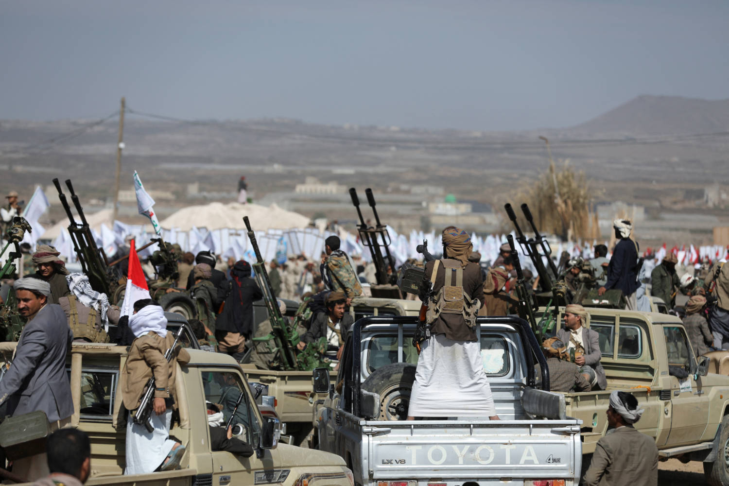 Houthi Tribesmen Parade To Show Defiance After U.s. And U.k. Air Strikes On Houthi Positions Near Sanaa