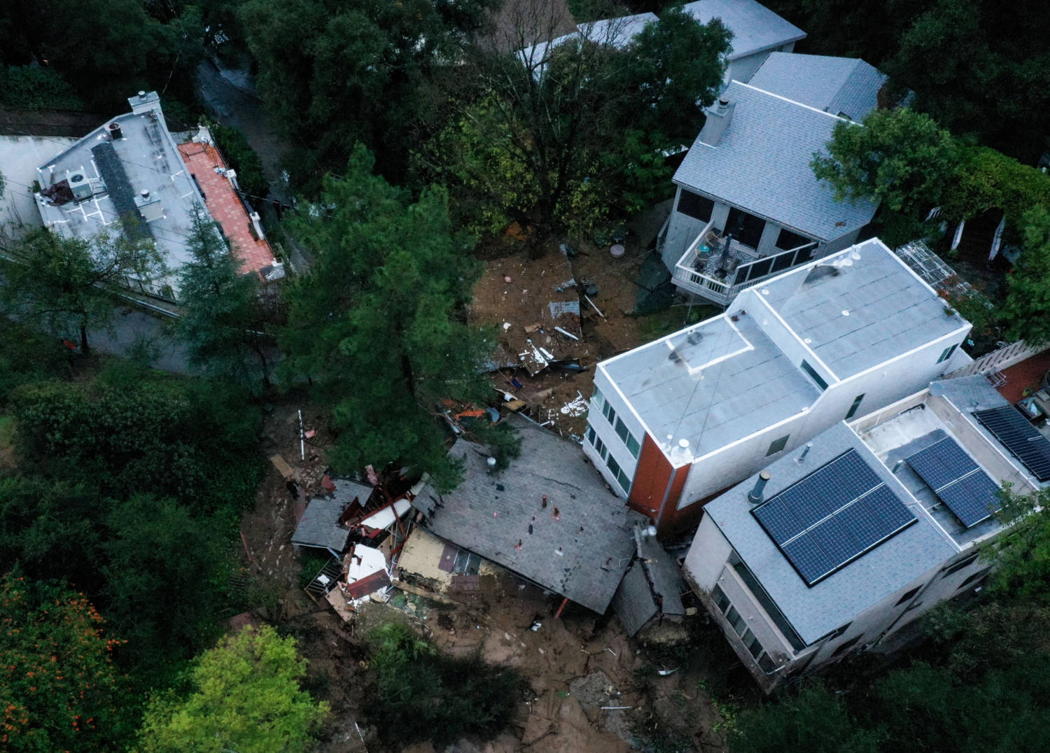 An Aerial View Of The Remains Of A Home Destroyed By A Mudslide Caused By An Ongoing Rain Storm In Los Angeles