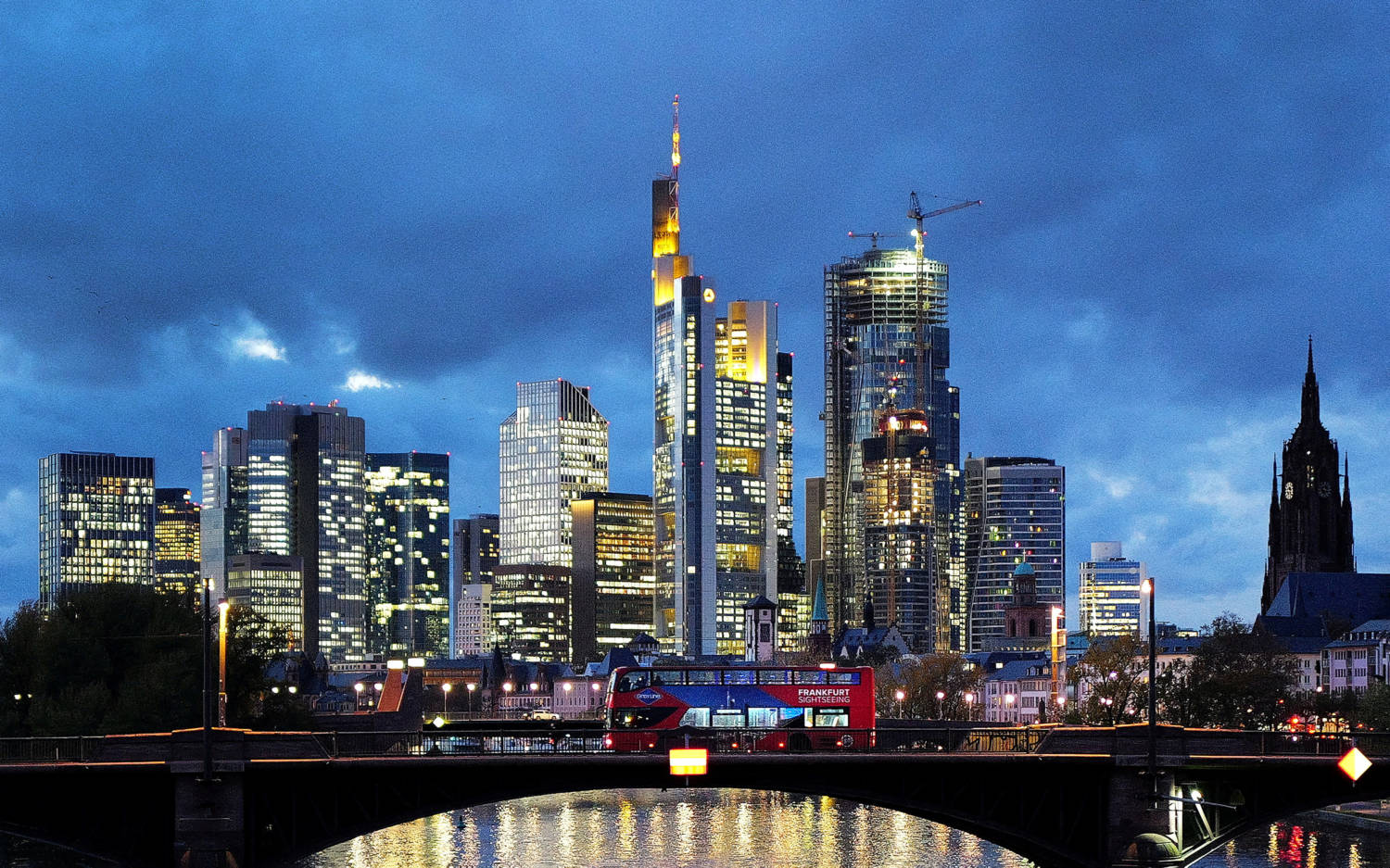File Photo: File Photo: A Double Decker Bus Passes The Skyline With Its Dominating Banking District In Frankfurt