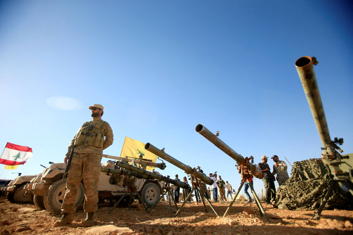 File Photo: A Hezbollah Fighter Stands In Front Of Anti Tank Artillery At Juroud Arsal