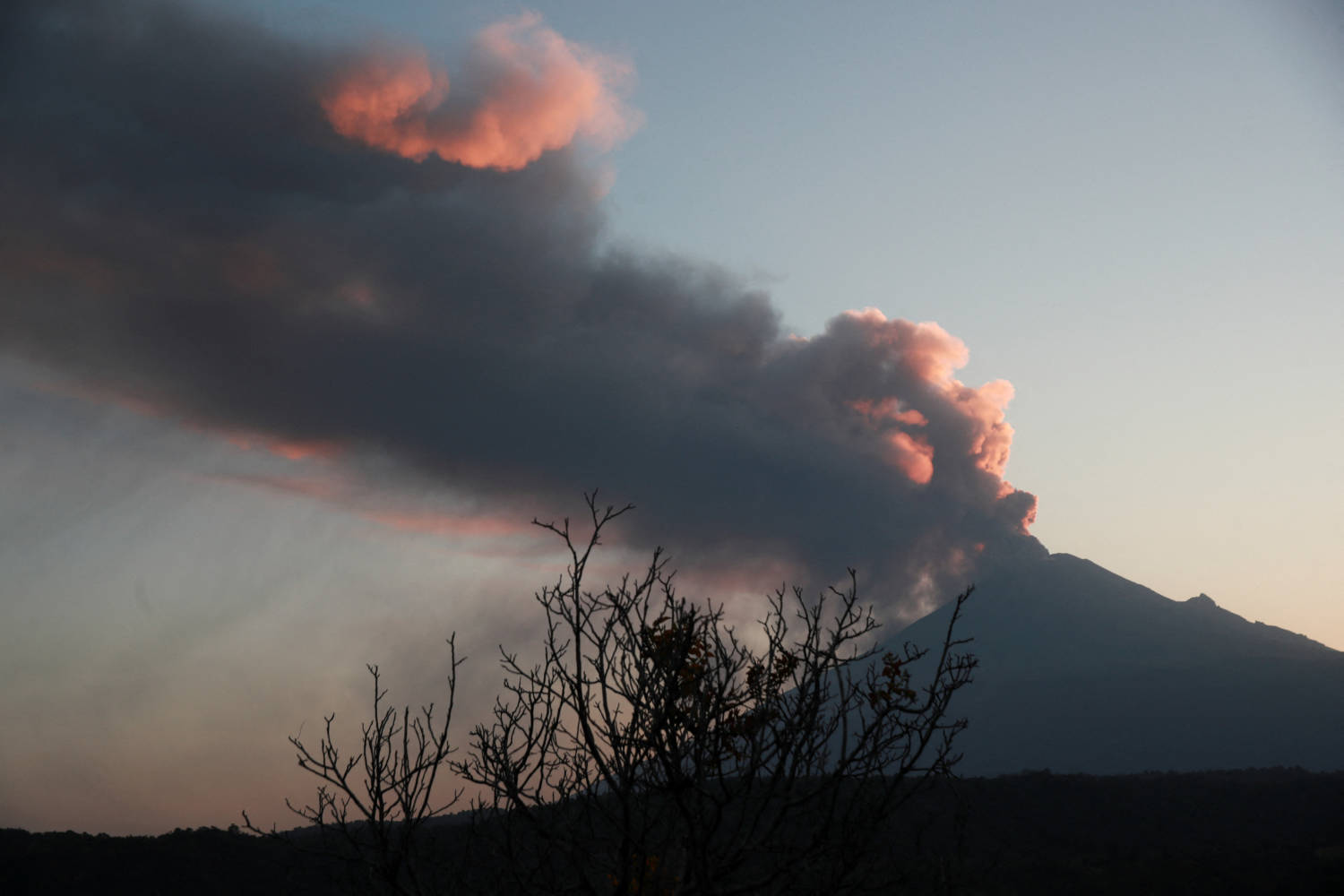 Popocatepetl Volcano Spews A Column Of Ash And Smoke, As Seen From Santiago Xalitzintla
