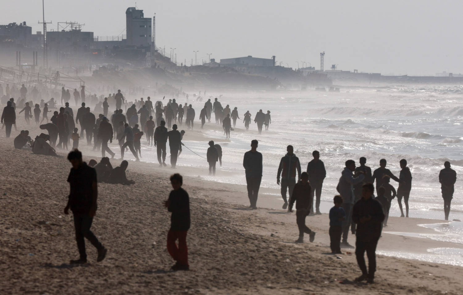 Palestinians Gather On A Beach In The Hope Of Getting Aid Air Dropped, In The Southern Gaza Strip