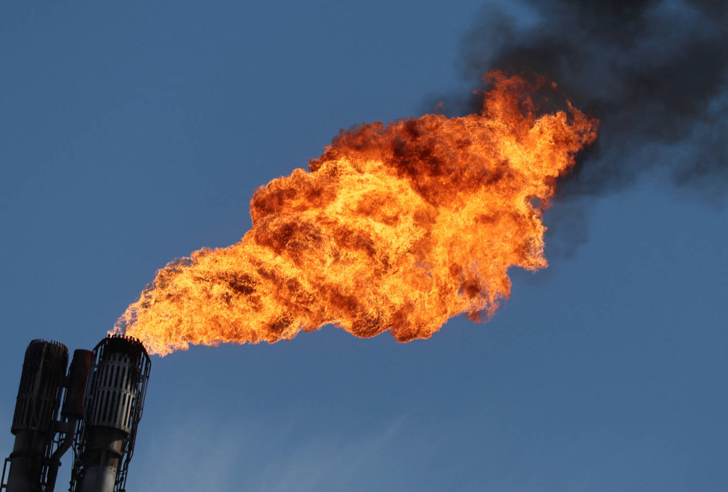 File Photo: A Pilot Flame Burns Atop Shell Energy And Chemicals Park Rhineland Near Cologne