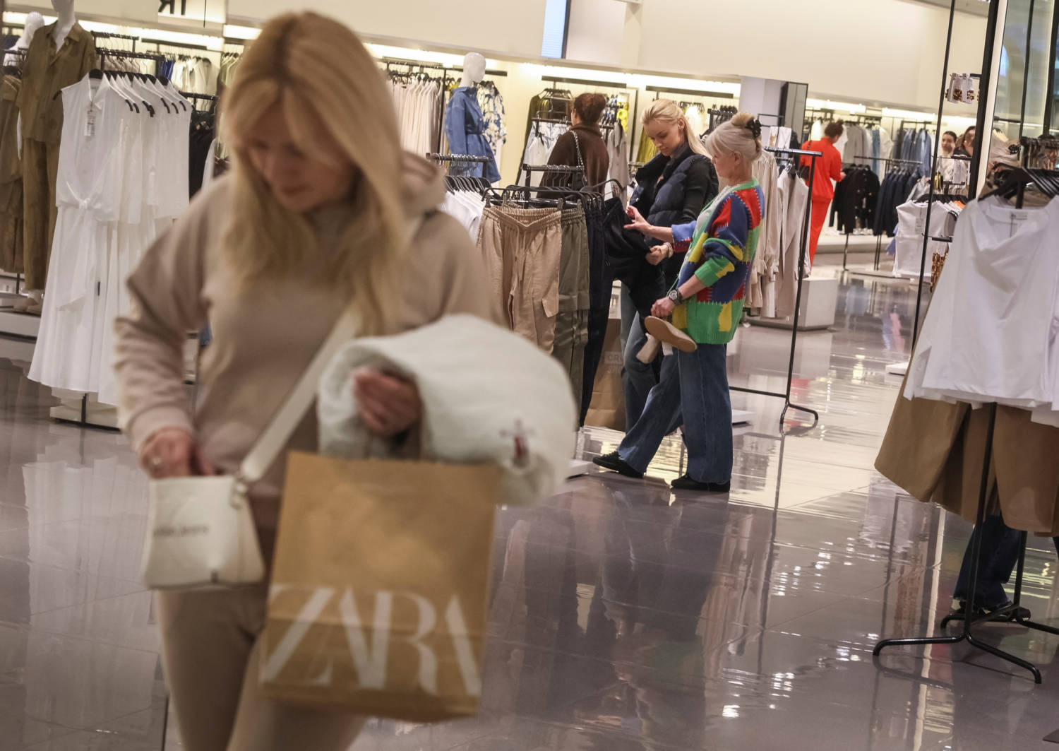 Shoppers Visit A Zara Store In A Shopping Mall In Kyiv