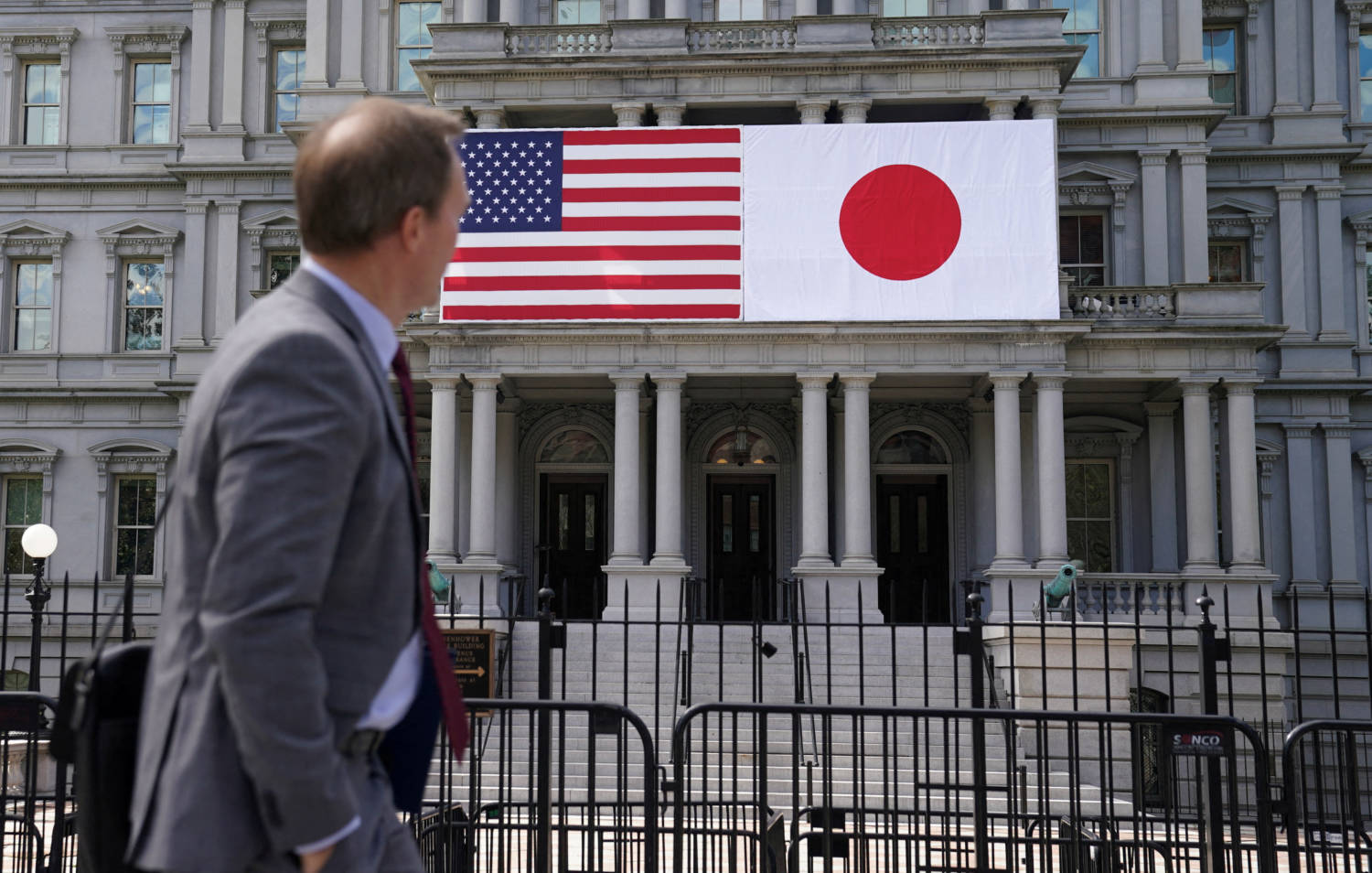 File Photo: Japanese And U.s. Flags Near The White House In Washington Ahead Of State Visit