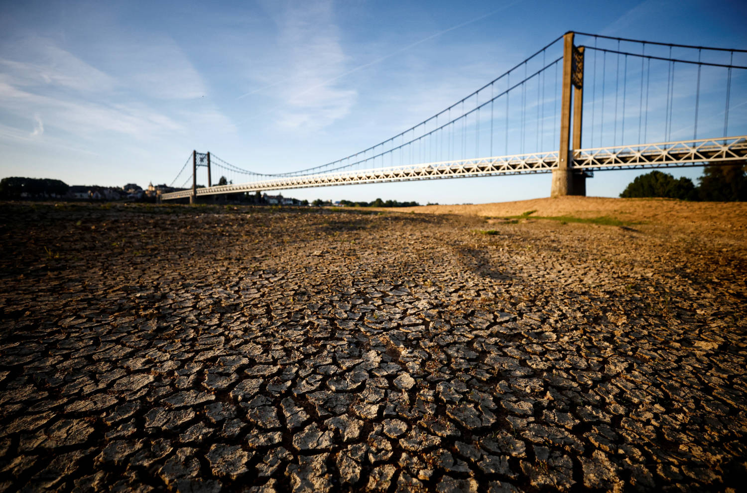 File Photo: Cracked And Dry Earth Is Seen In The Wide Riverbed Of The Loire River In Ancenis Saint Gereon