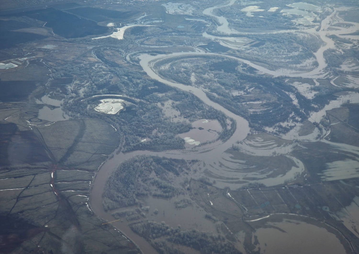 An Aerial Picture Taken From A Plane Shows A Flooded Area Near The City Of Orenburg