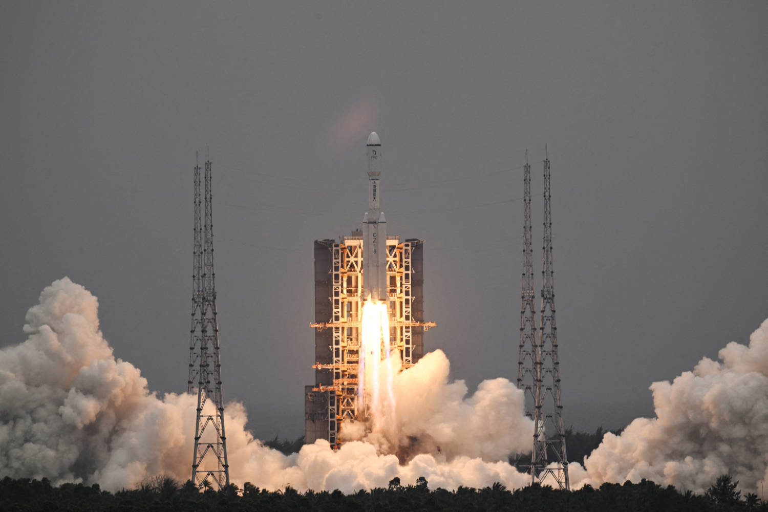 File Photo: Long March 8 Rocket, Carrying The Relay Satellite Queqiao 2 For Earth Moon Communications, Blasts Off In Hainan