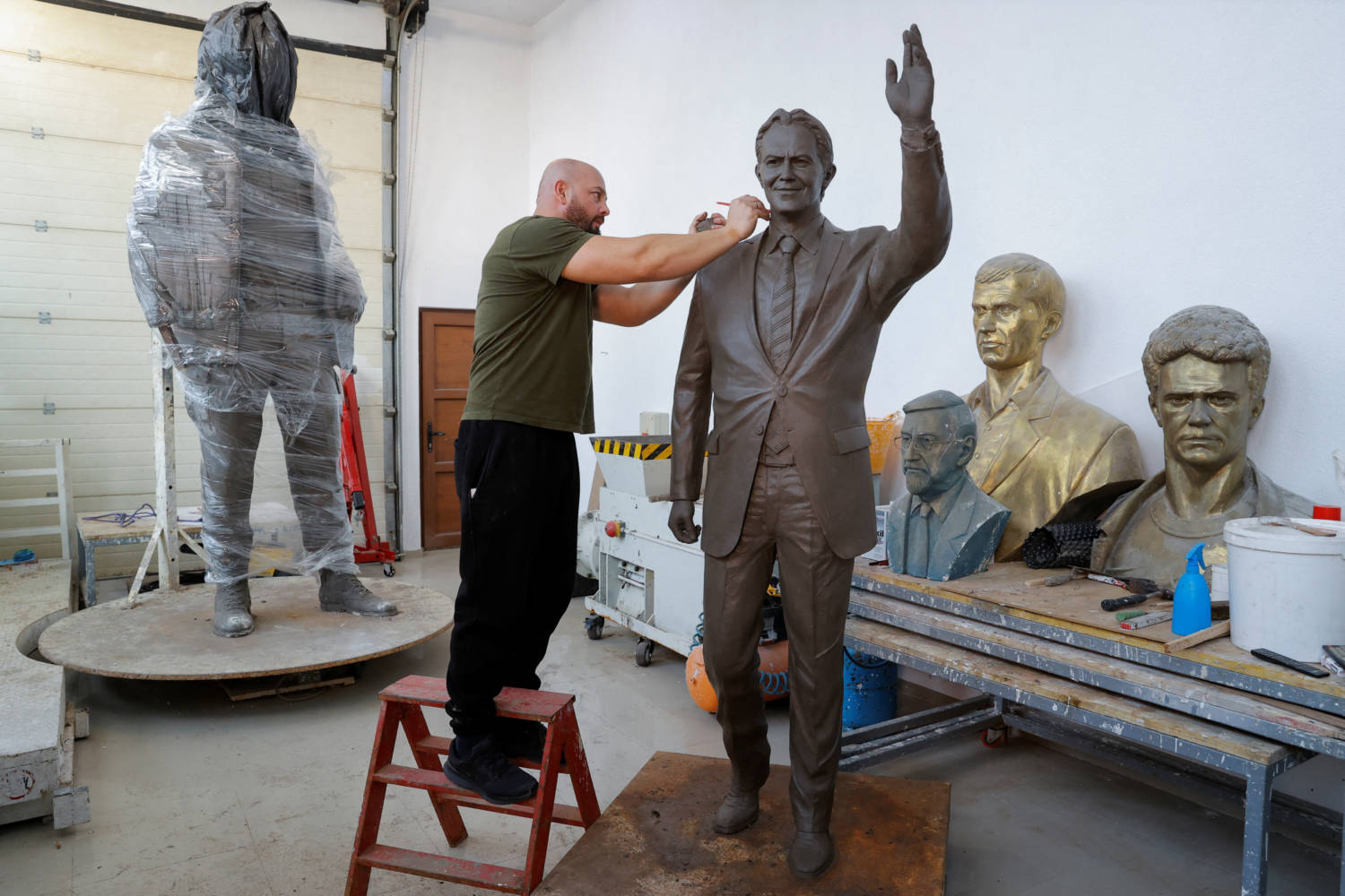 Sculptor Agon Qosa Works On A Statue Of Britain's Former Prime Minister Tony Blair, In Ferizaj