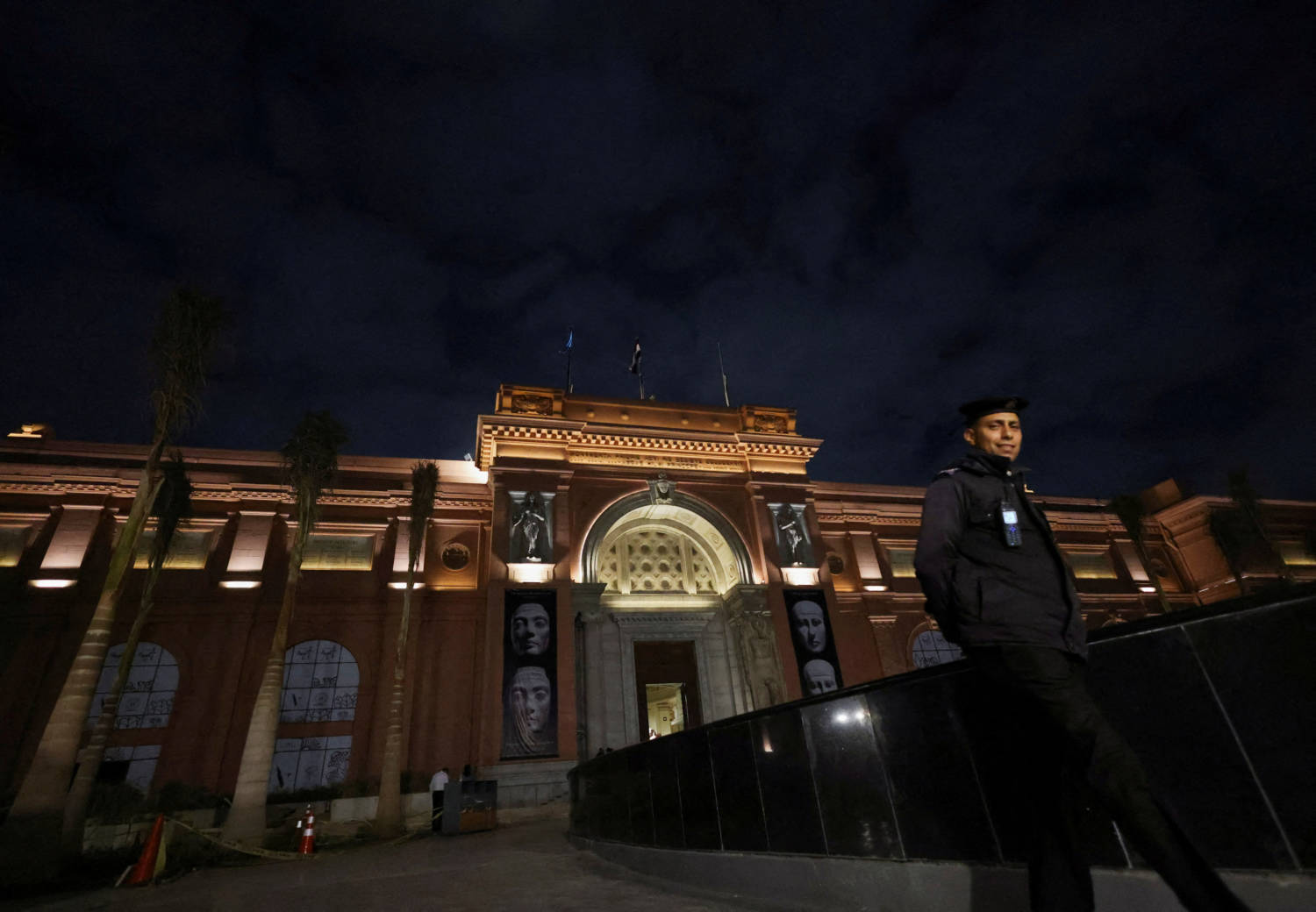 File Photo: A Police Officer Walks Next To An Entrance Of The Egyptian Museum In Egypt's Capital Of Cairo