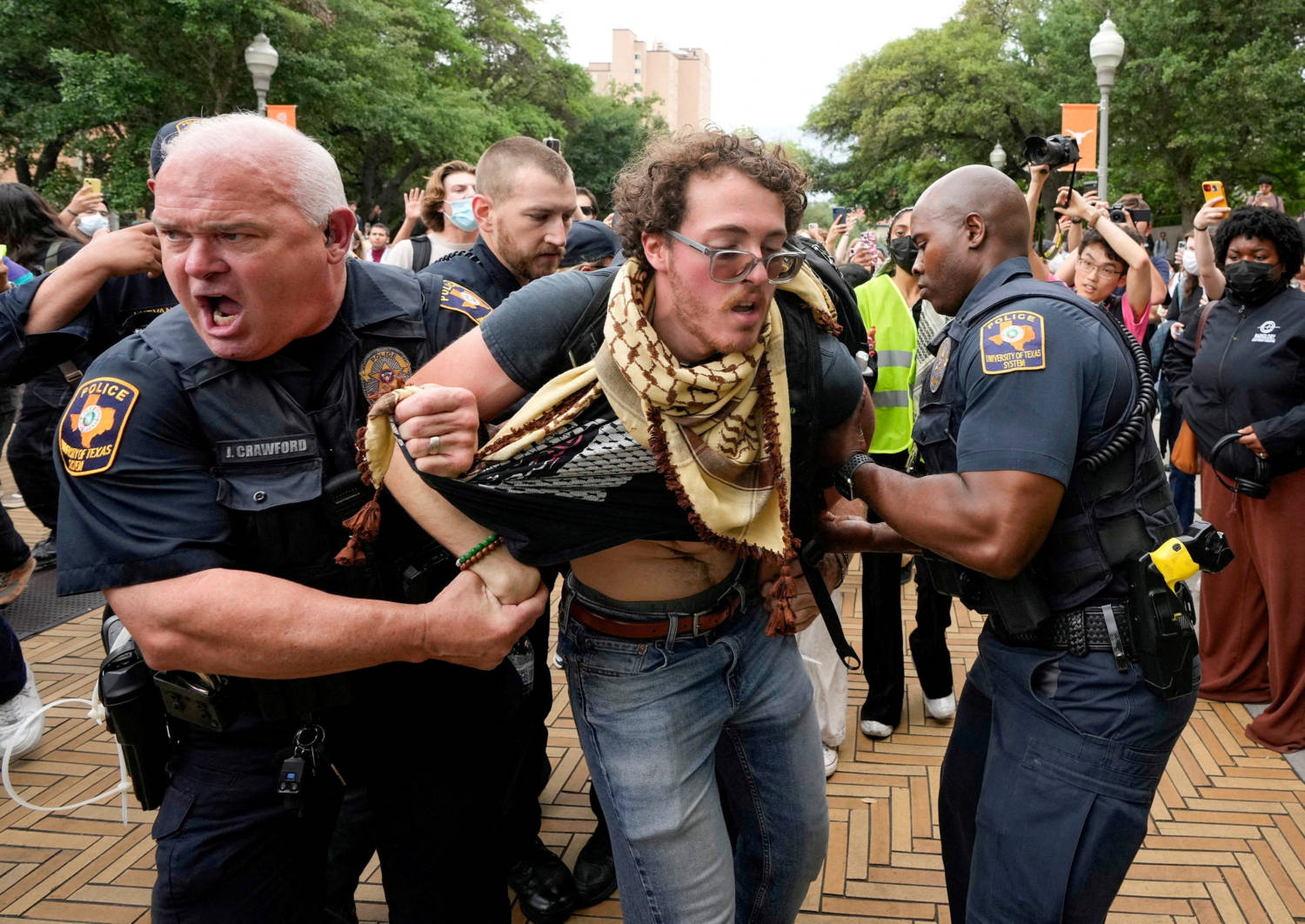 University Of Texas Police Detain A Man At A Pro Palestinian Protest At The University Of Texas