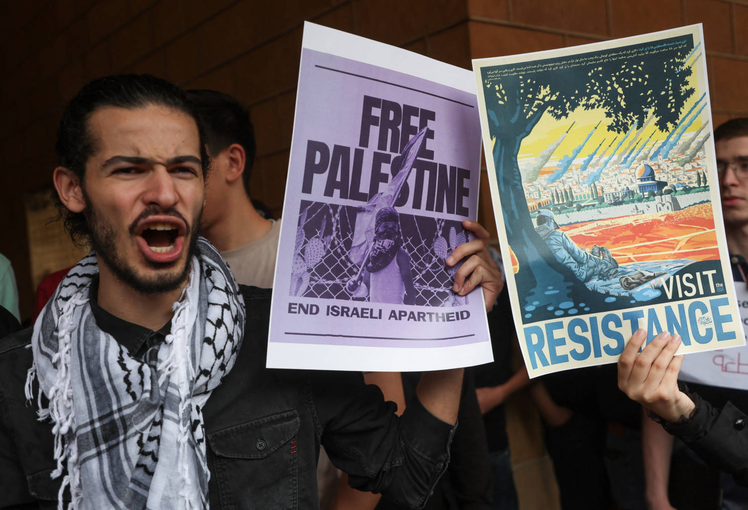 A Demonstrator Holds A Sign During A Protest In Solidarity With Gaza At The American University Of Beirut