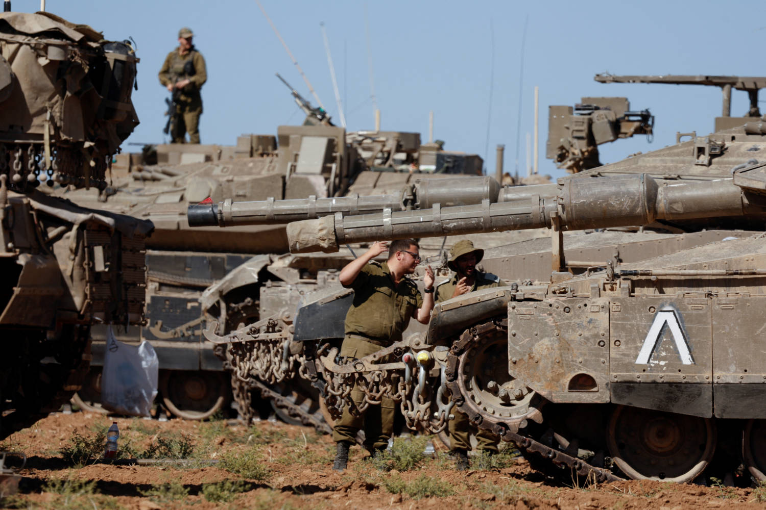 Israeli Soldiers Stand Next To Military Vehicles, Amid The Ongoing Conflict Between Israel And The Palestinian Islamist Group Hamas, Near The Israel Gaza Border, In Southern Israel