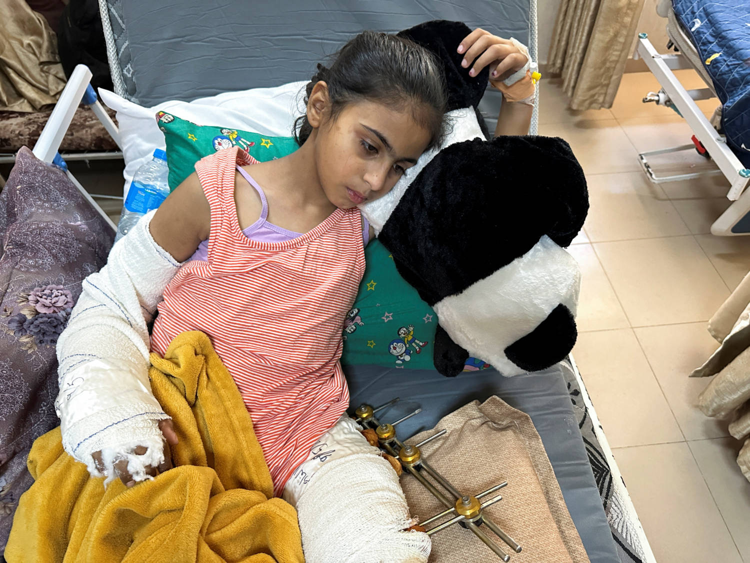 Lama Abu Holi, An 8 Year Old Injured Palestinian Girl Sits In Al Aqsa Hospital In Deir Al Balah